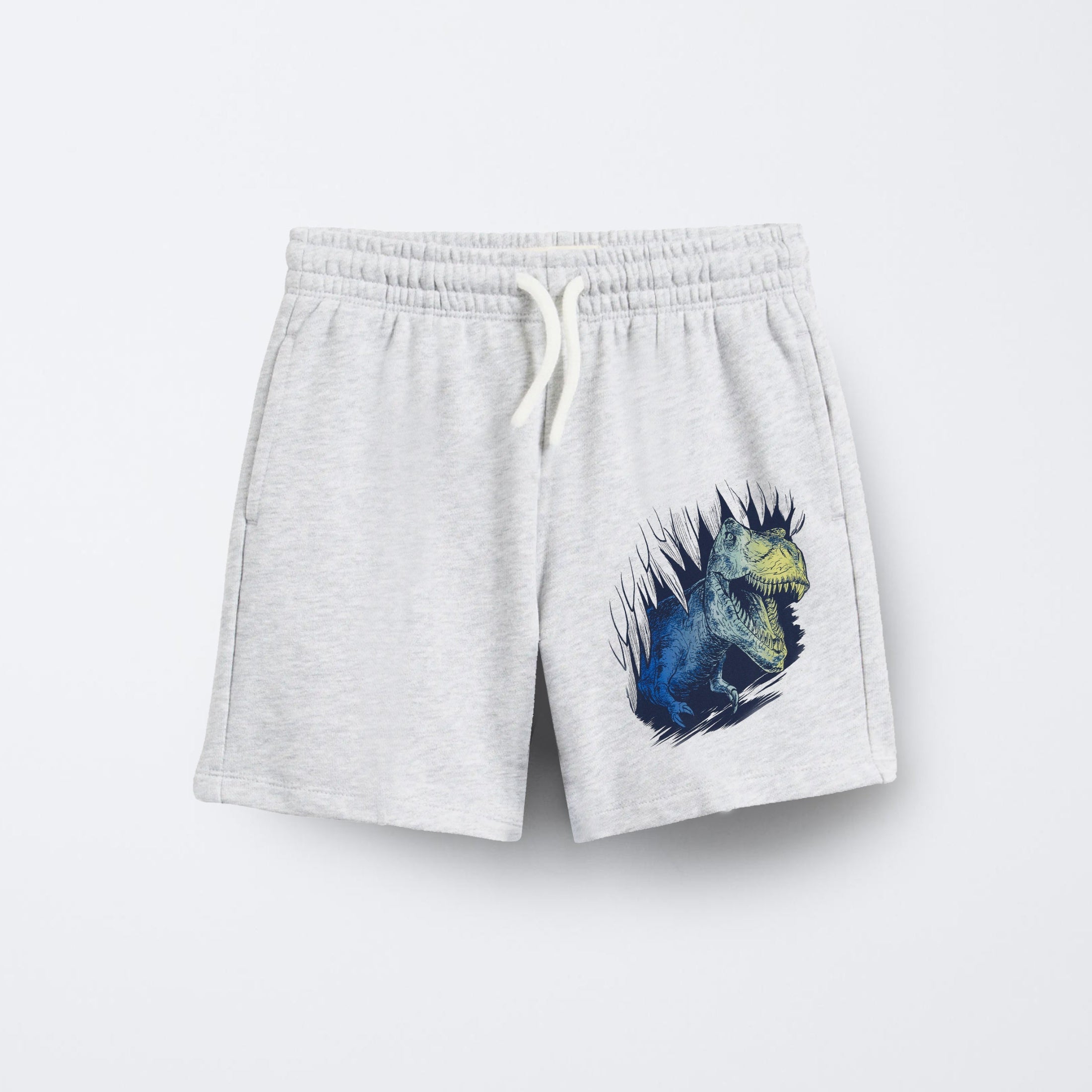White shorts with a dinosaur graphic on a white background